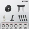 Conteúdo do kit essencial preto: gaiola vibratória, cinto de tiras, cadeado, plug curvo e seis anéis