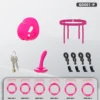 Conteúdo do kit essencial rosa: gaiola vibratória, cinto de tiras, cadeado, plug curvo e seis anéis