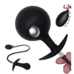 Bulbo do plug anal inflável com a esfera de aço maciça visível por dentro e a bomba de pera ao lado