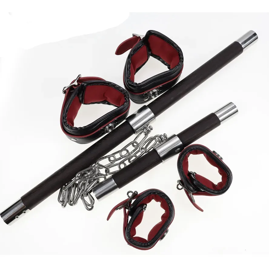 Kit completo da barra de contenção dupla, com as quatro algemas de couro e as duas barras de madeira