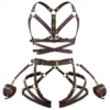 Peças separadas do conjunto harness Soberana: busto, quadril e algemas