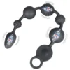 Anal beads vibratório Rosário em silicone preto, com seis esferas de calibres alternados e anel de puxar