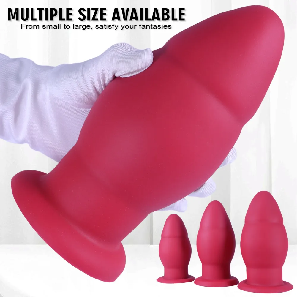 Crimson Throne segurado com luva para mostrar o tamanho real do plug